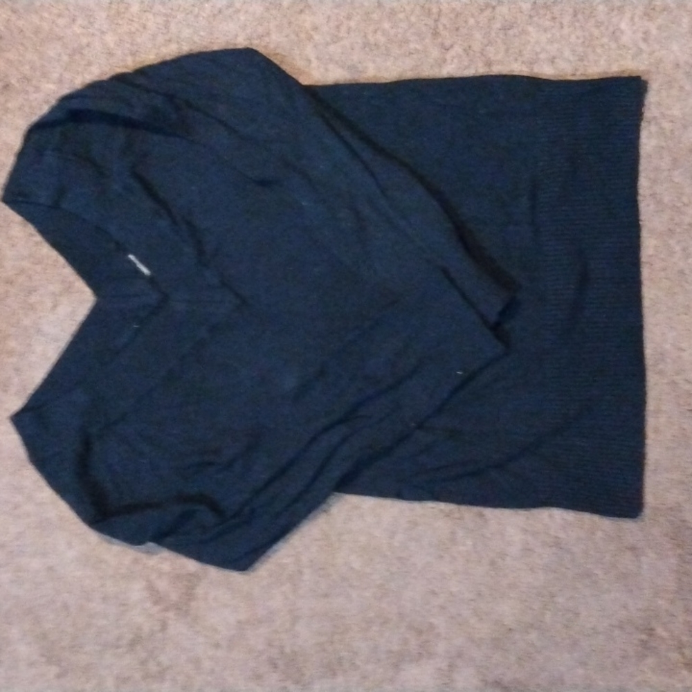 Twenty-one large black sweater
